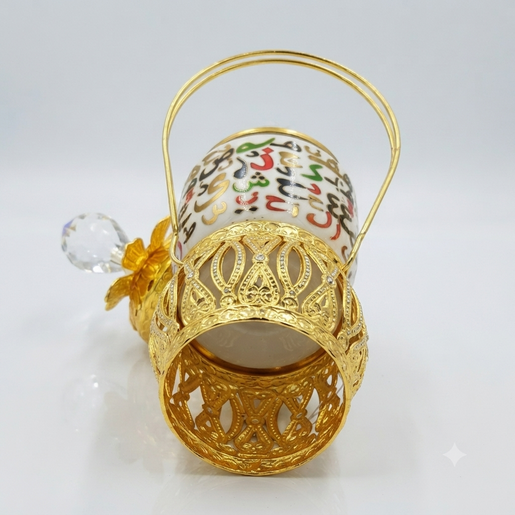 Ornate golden cup with floral accent - Image 2